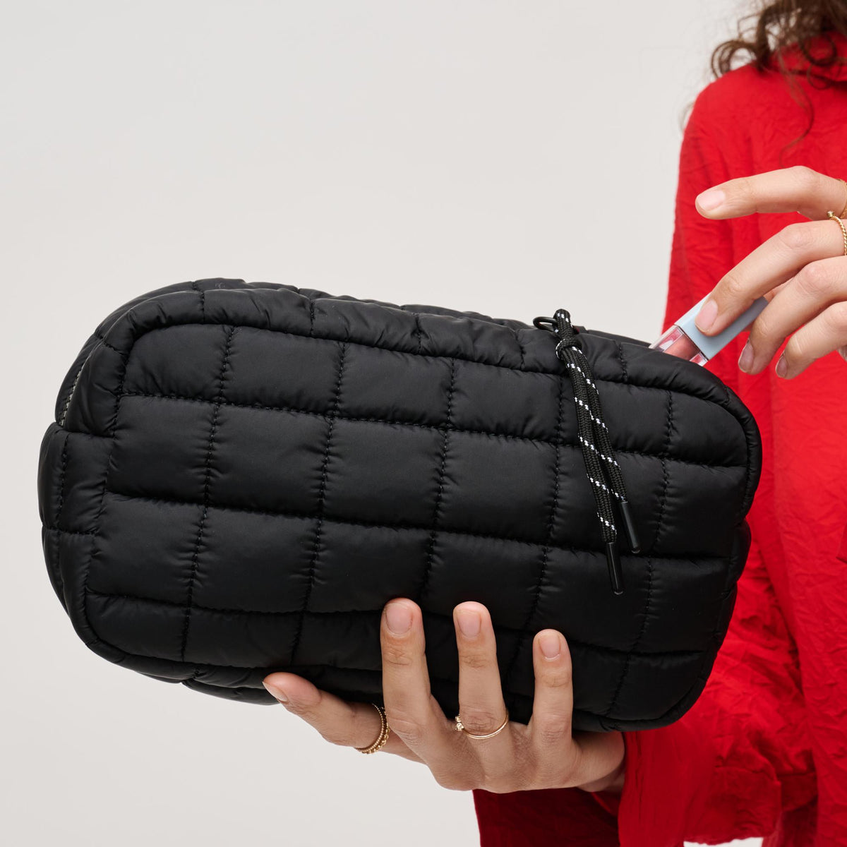 Woman wearing Black Urban Essentials Cloud Nine - Puffer Cosmetic & Travel Organizer Pouch 840611123480 View 2 | Black