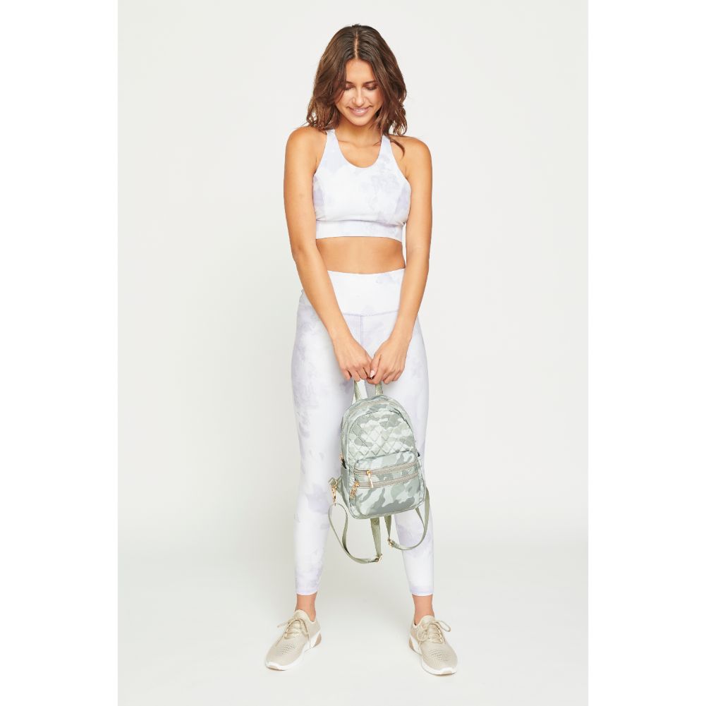 Woman wearing Sage Camo Urban Expressions Brynlee Sling Backpack 840611180476 View 3 | Sage Camo