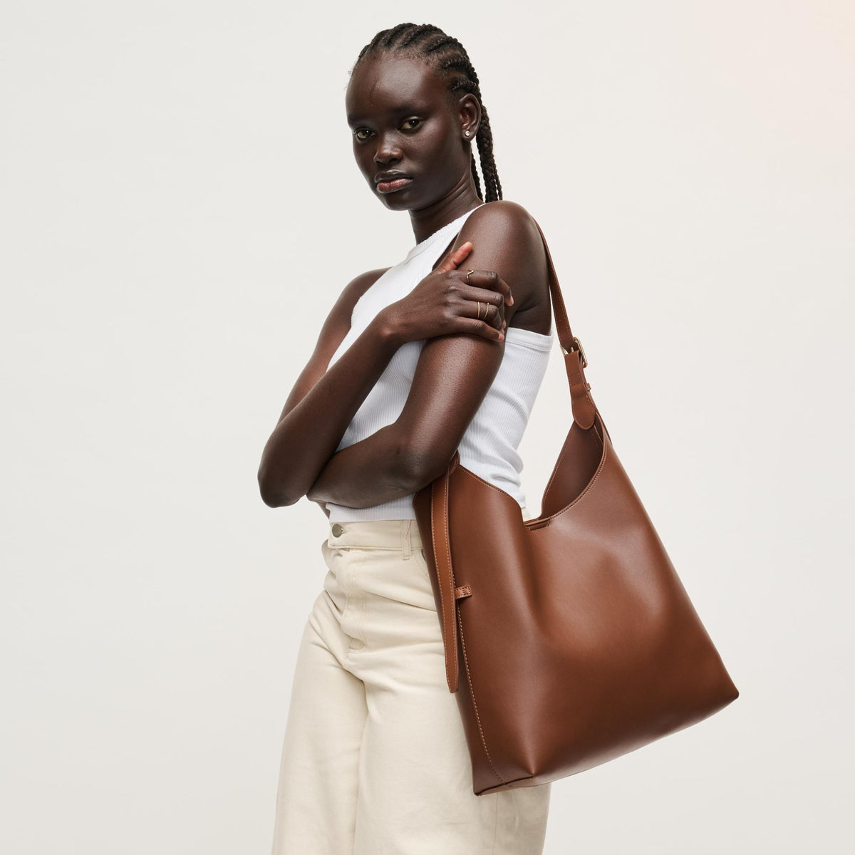 Woman wearing Chocolate Urban Expressions Maria Hobo 840504206269 View 3 | Chocolate