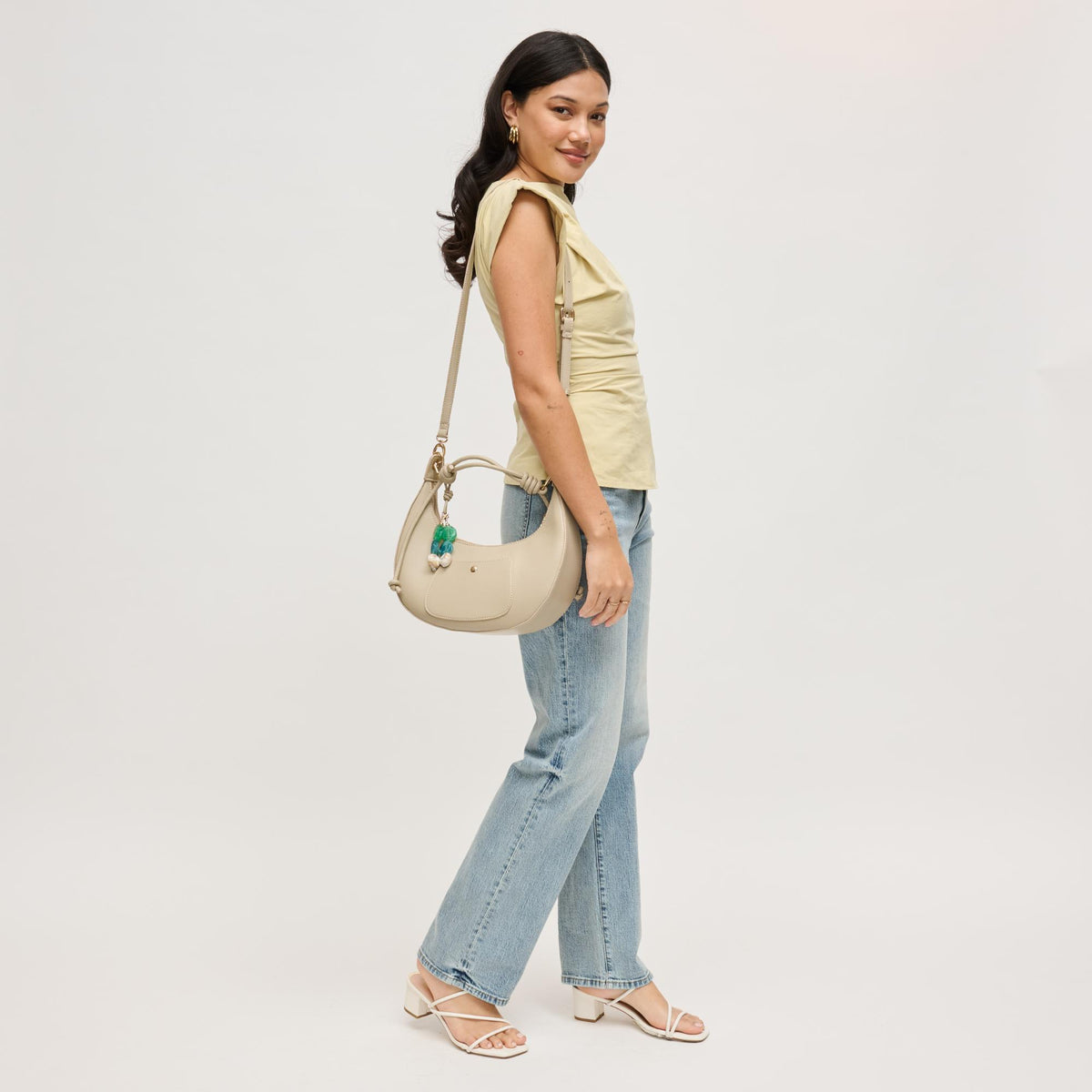Woman wearing Sage Urban Expressions Emilia Hobo 840504206467 View 3 | Sage