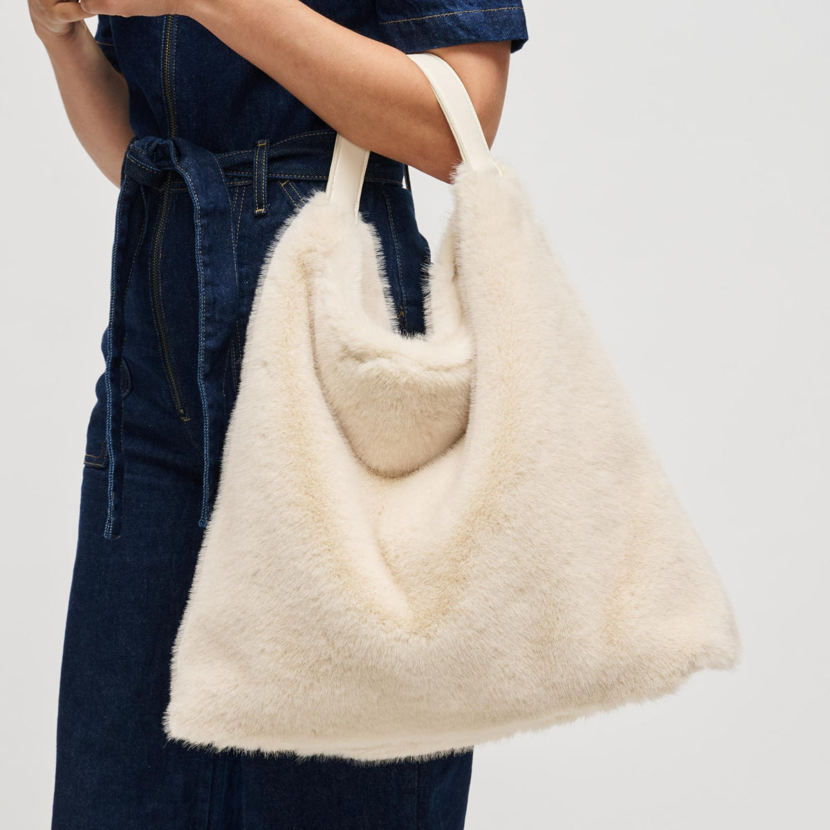 Woman wearing Almond Urban Expressions Chandler Hobo 840611199577 View 4 | Almond
