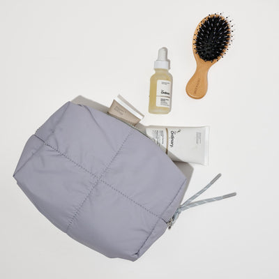 Woman wearing Grey Urban Essentials Daydreamer - Nylon Cosmetic & Travel Organizer Pouch 840611197641 View 1 | Grey