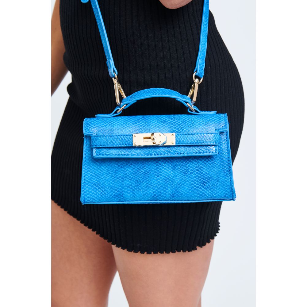 Woman wearing Blue Urban Expressions Georgina Snake Crossbody 840611181275 View 2 | Blue