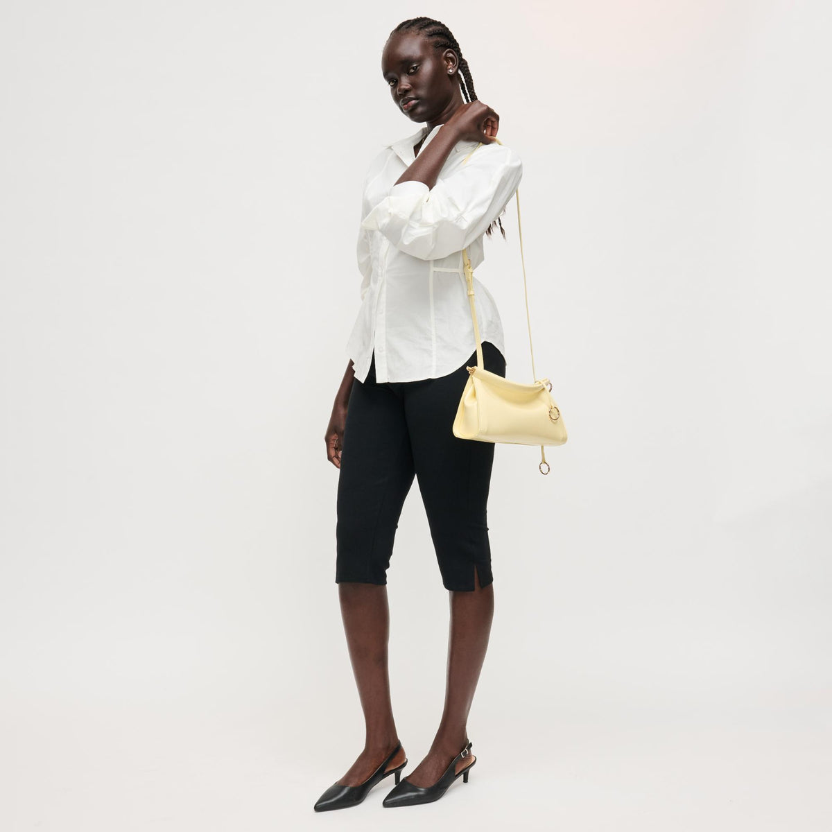 Woman wearing Butter Urban Expressions Elowyn Crossbody 840504208034 View 3 | Butter