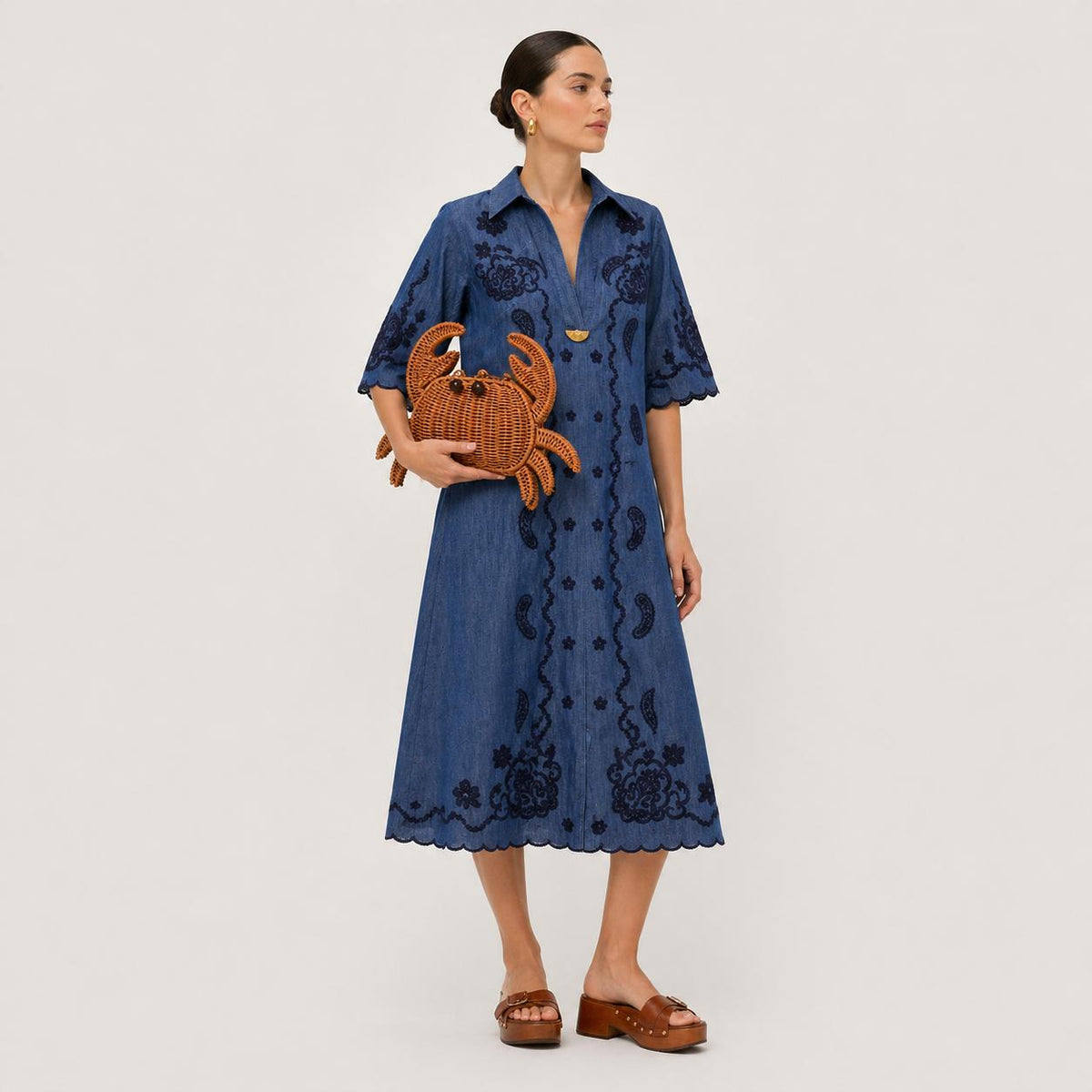 Woman wearing Tan Urban Expressions Sebastian Clutch 840504210242 View 2 | Tan