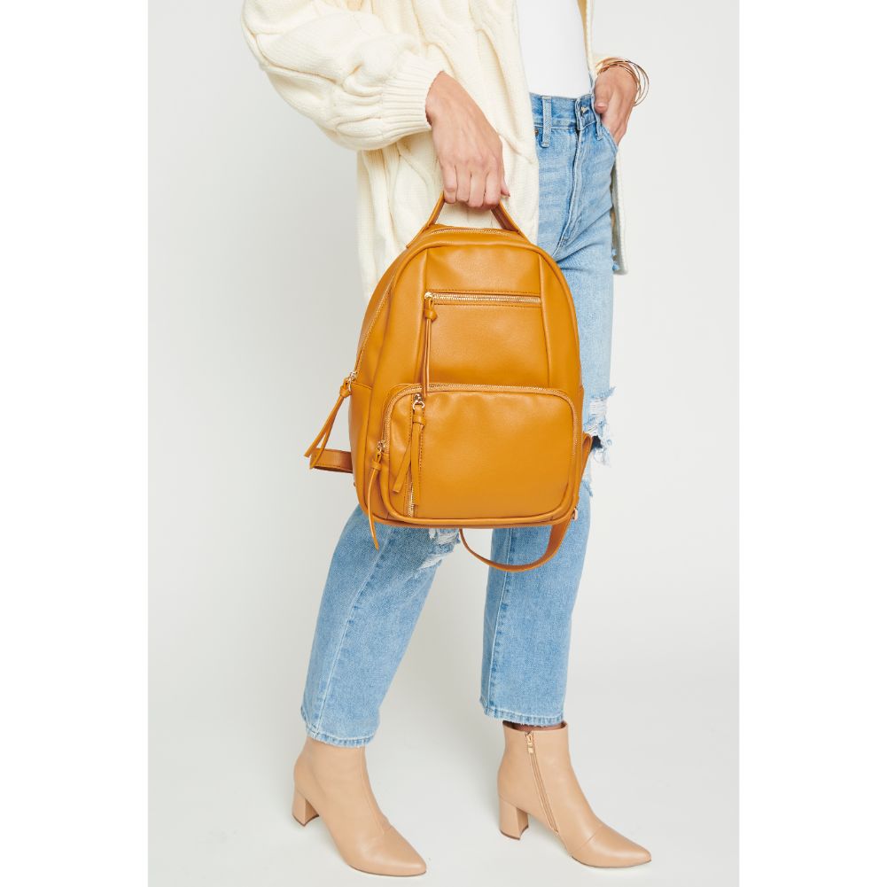 Woman wearing Mustard Urban Expressions Preston Backpack 840611175267 View 4 | Mustard