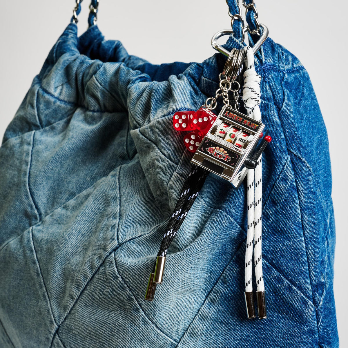 Woman wearing Multi Urban Expressions Vegas Hanging Charm 840611150684 View 1 | Multi