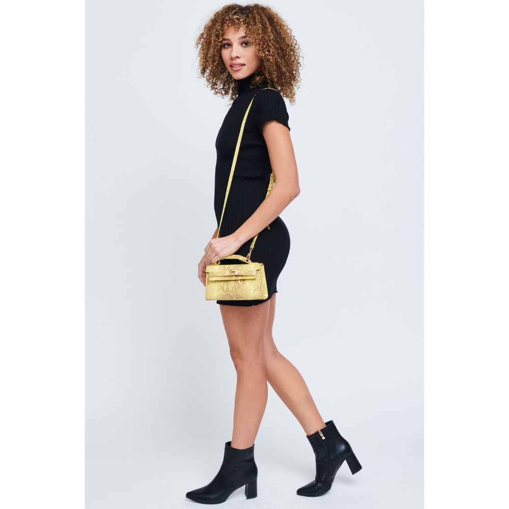 Woman wearing Canary Urban Expressions Georgina Snake Crossbody 840611171986 View 4 | Canary