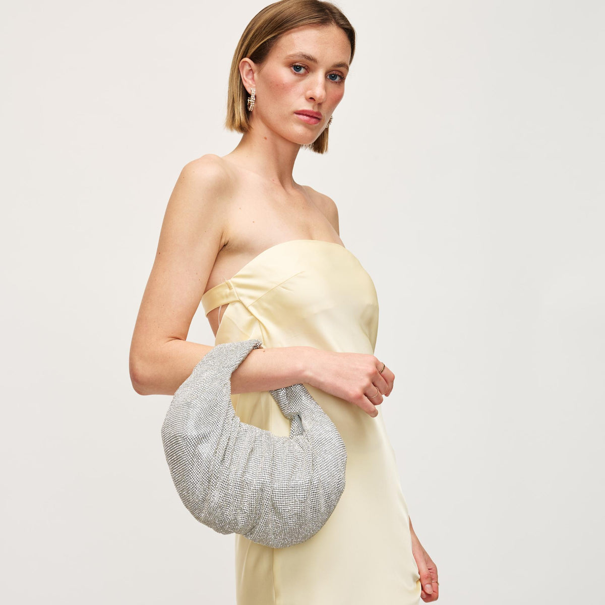 Woman wearing Silver Urban Expressions Arianna Evening Bag 840611160485 View 1 | Silver