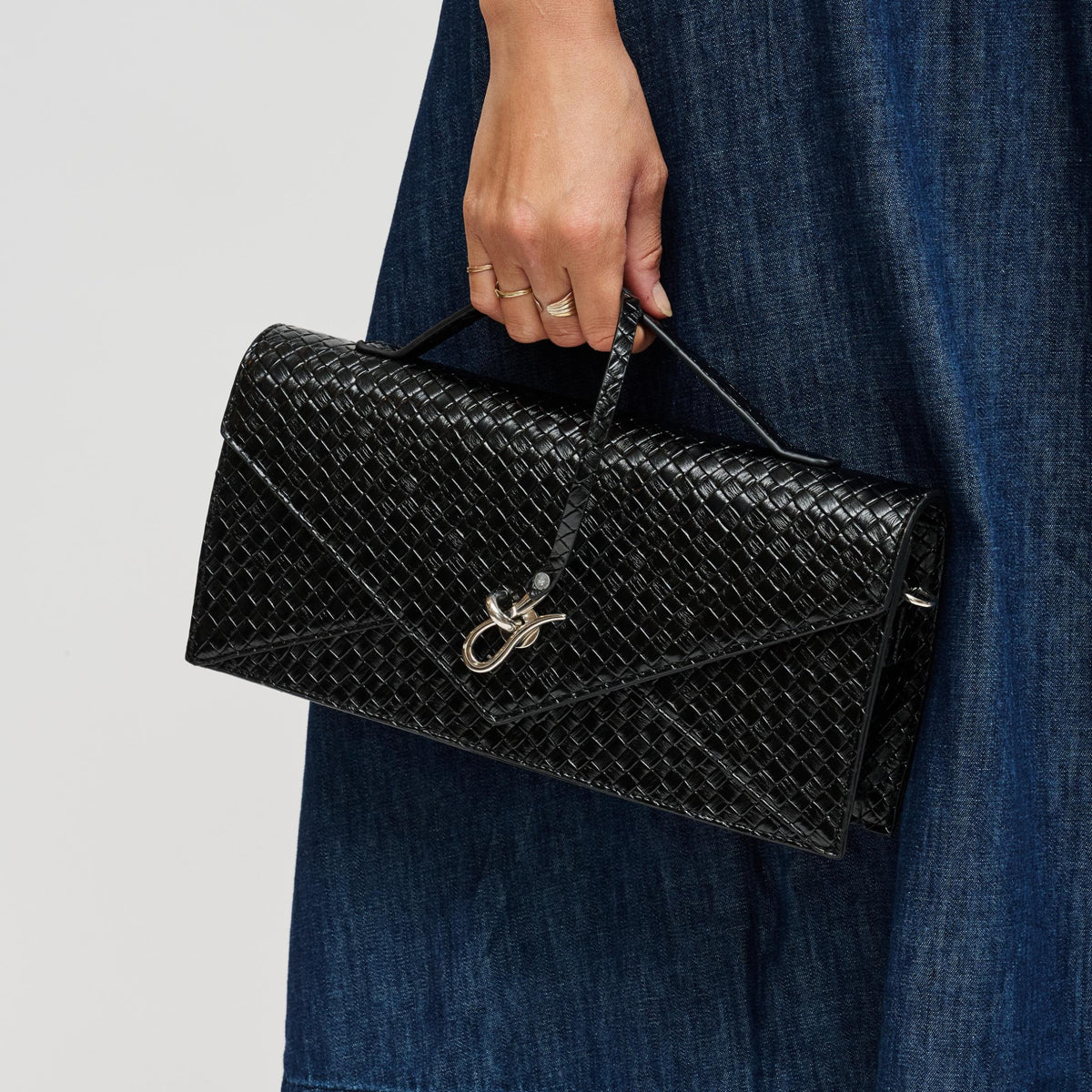 Woman wearing Black Urban Expressions Khaleesi Clutch 840504211874 View 1 | Black