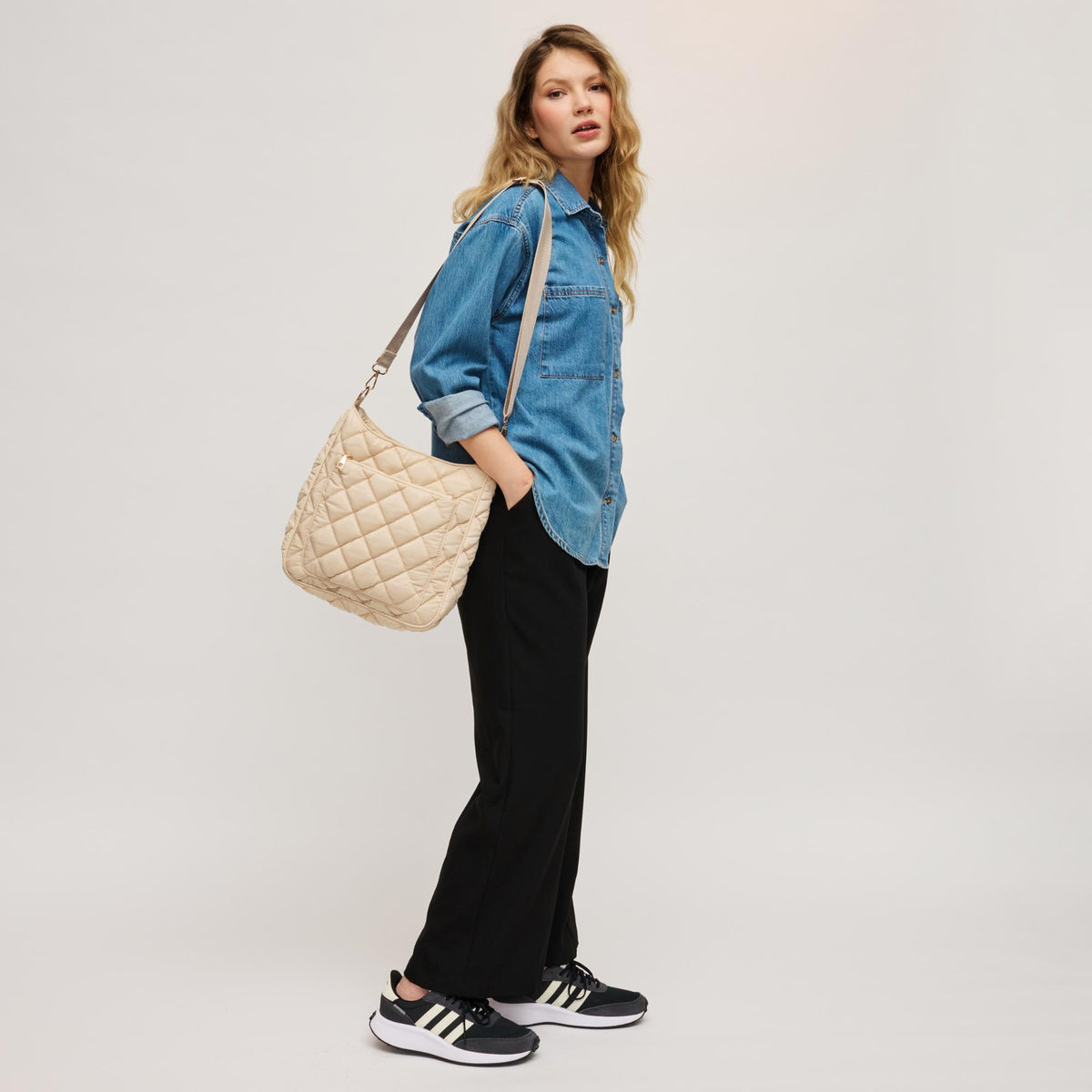 Woman wearing Cream Urban Expressions Fia - Quilted Puffer Crossbody 840504207327 View 4 | Cream