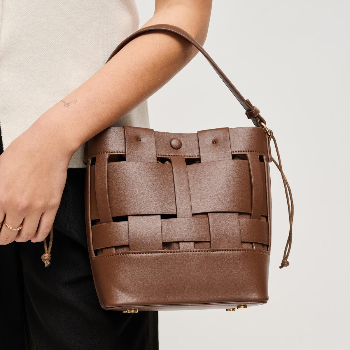 Woman wearing Chocolate Urban Expressions Parker Crossbody 840504205453 View 1 | Chocolate