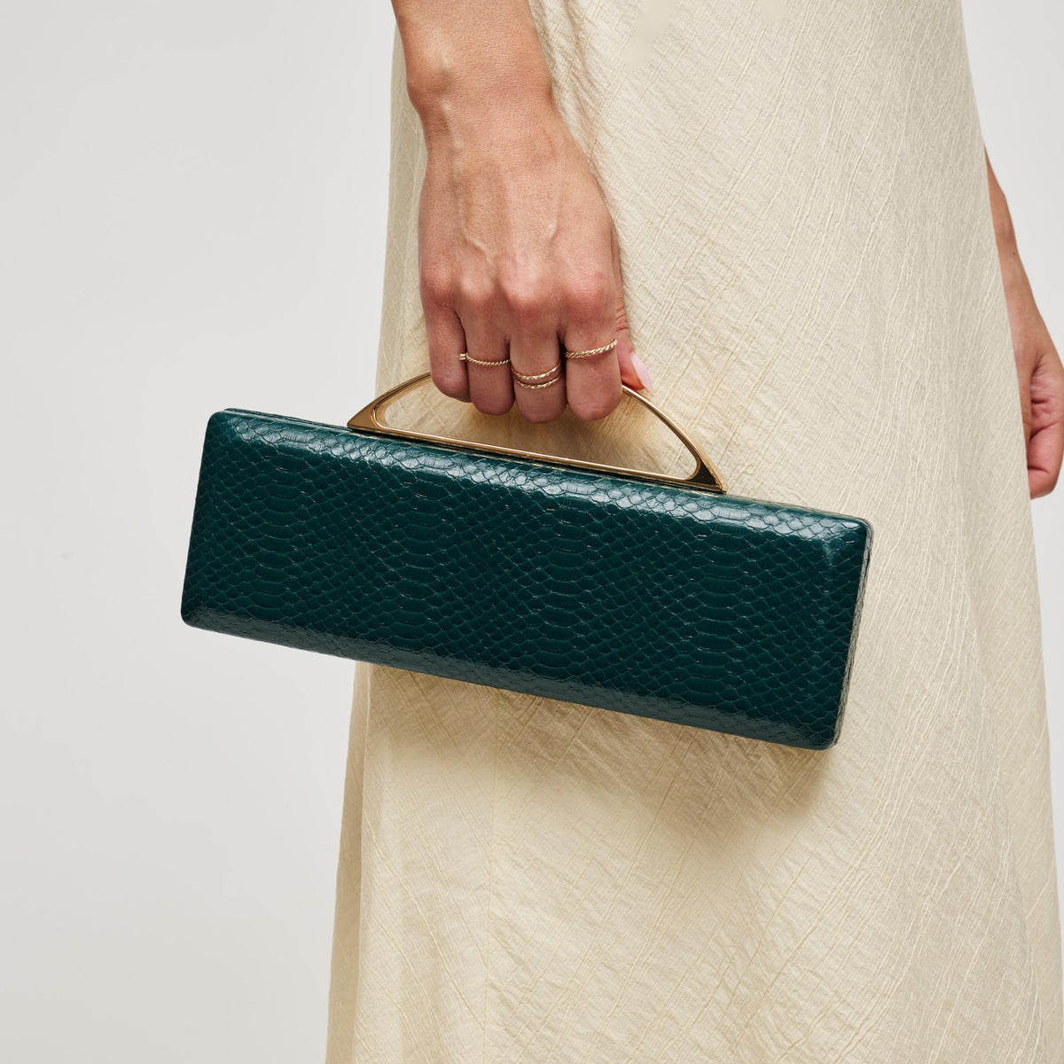 Woman wearing Emerald Urban Expressions Banks Clutch 840504212093 View 1 | Emerald