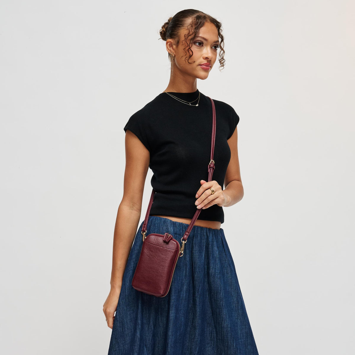 Woman wearing Burgundy Urban Expressions Karen Cell Phone Crossbody 840504212789 View 1 | Burgundy