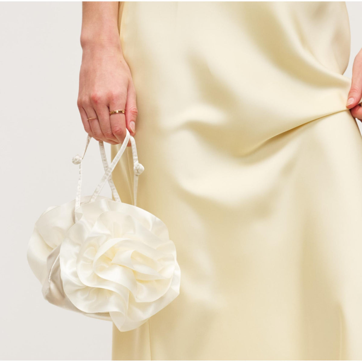 Woman wearing Ivory Urban Expressions Fleur Luxe Evening Bag 840611149800 View 1 | Ivory