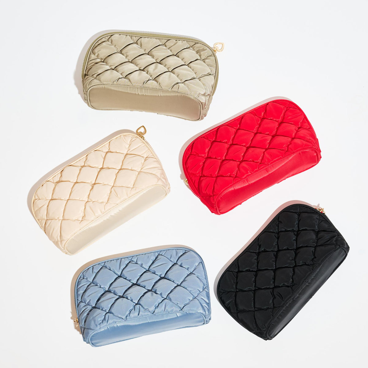 Woman wearing Dusty Blue Urban Essentials Cloud Kiss - Quilted Puffer Nylon Cosmetic & Travel Organizer Dome Pouch 840611197115 View 2 | Dusty Blue