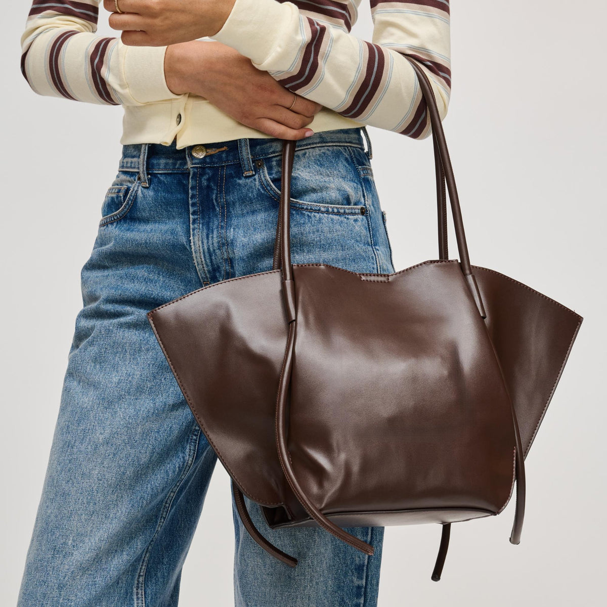 Woman wearing Chocolate Urban Expressions Caspien Tote 840504213267 View 2 | Chocolate