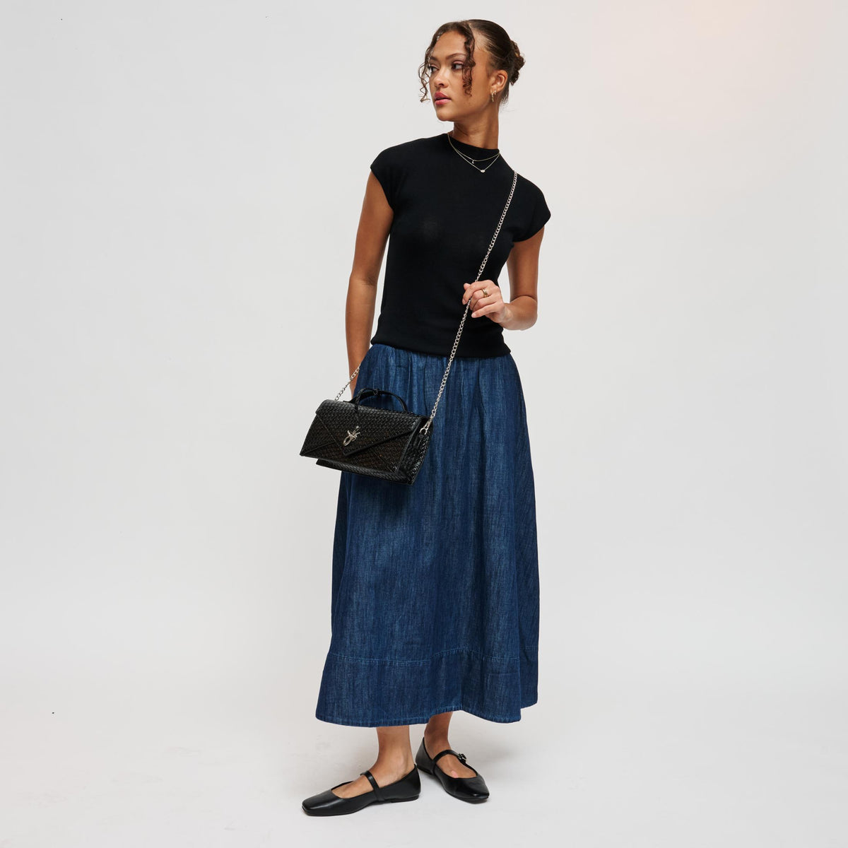 Woman wearing Black Urban Expressions Khaleesi Clutch 840504211874 View 4 | Black