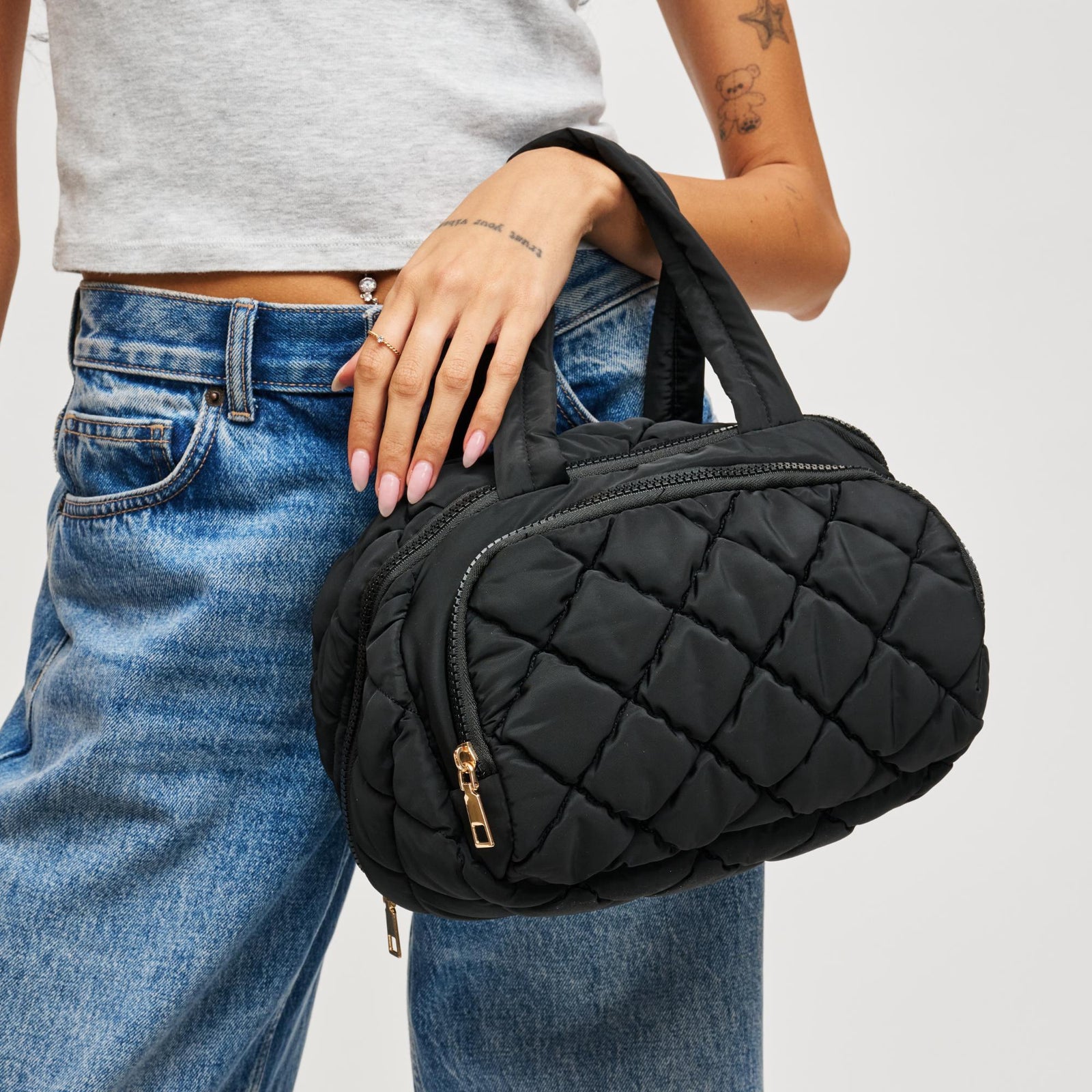 Woman wearing Desert Sage Urban Expressions Zip Me Pretty - Quilted Puffer Travel Organizer 840504201196 View 1 | Desert Sage