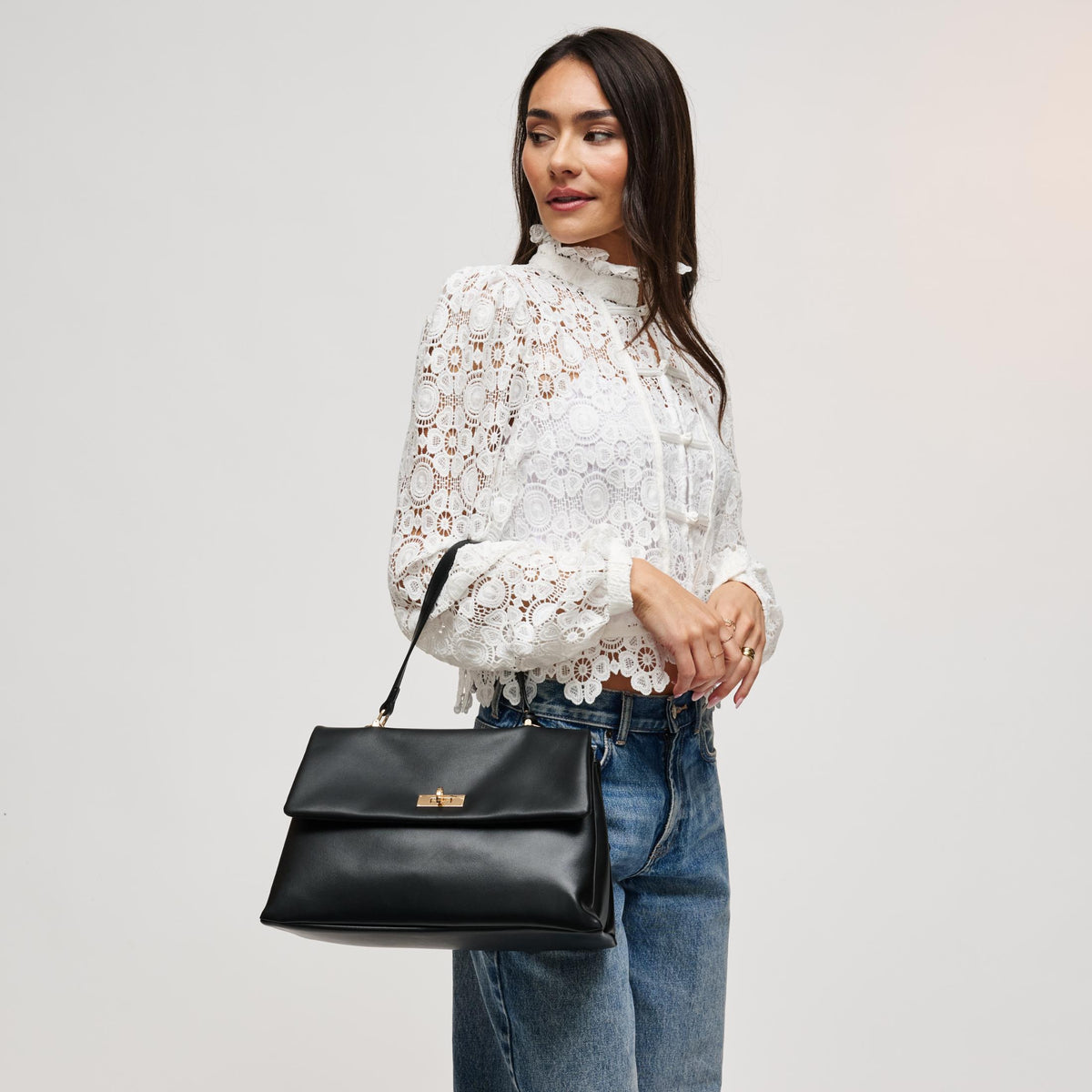 Woman wearing Black Urban Expressions Arrow Satchel 840504212925 View 1 | Black