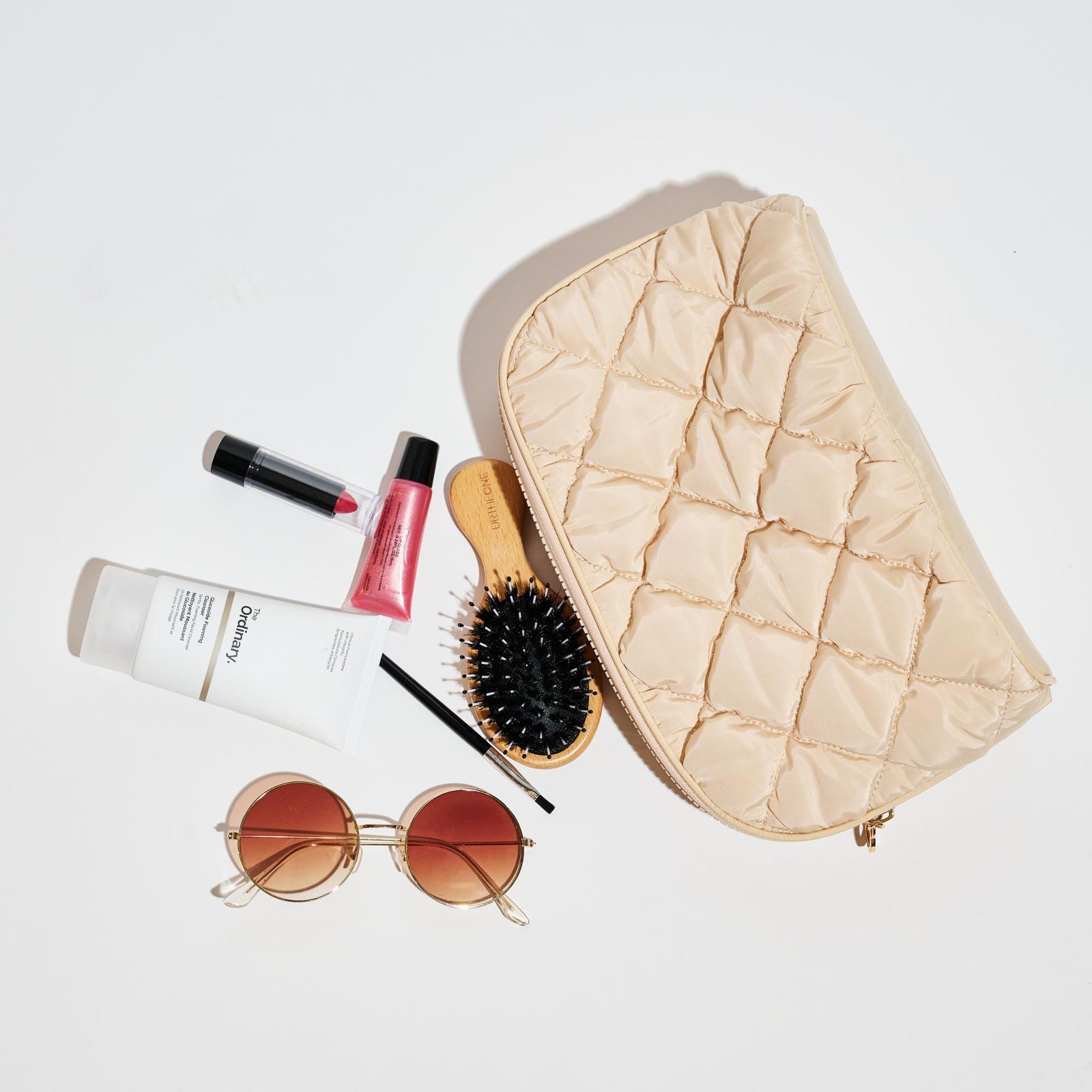 Woman wearing Black Urban Essentials Cloud Kiss - Quilted Puffer Nylon Cosmetic & Travel Organizer Dome Pouch 840611197085 View 1 | Black