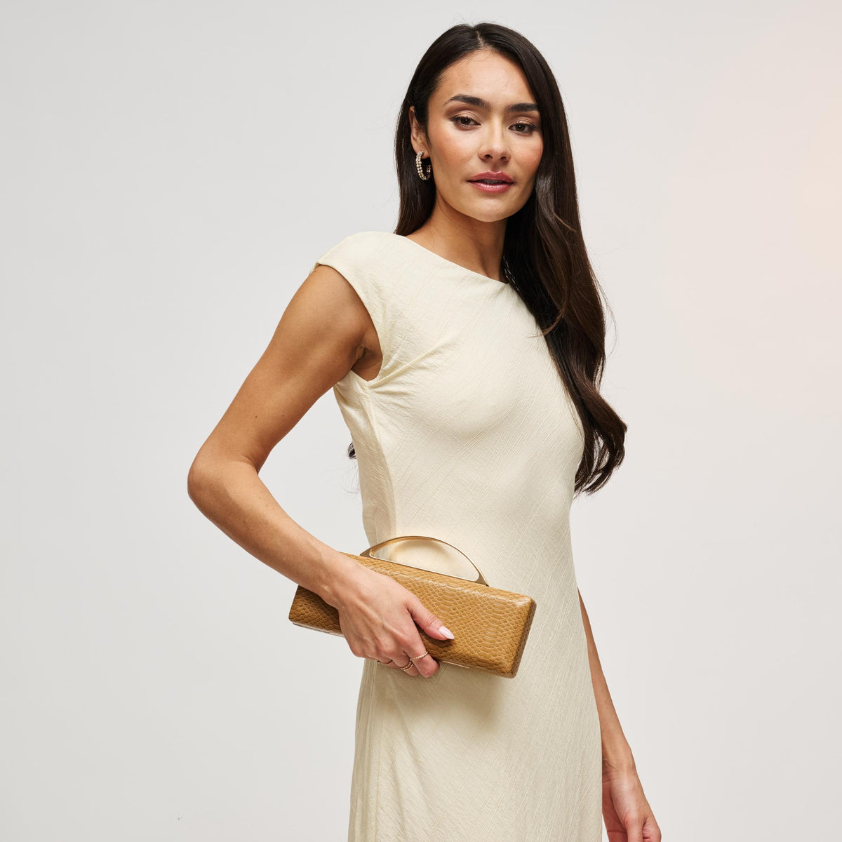 Woman wearing Mustard Urban Expressions Banks Clutch 840504212079 View 2 | Mustard