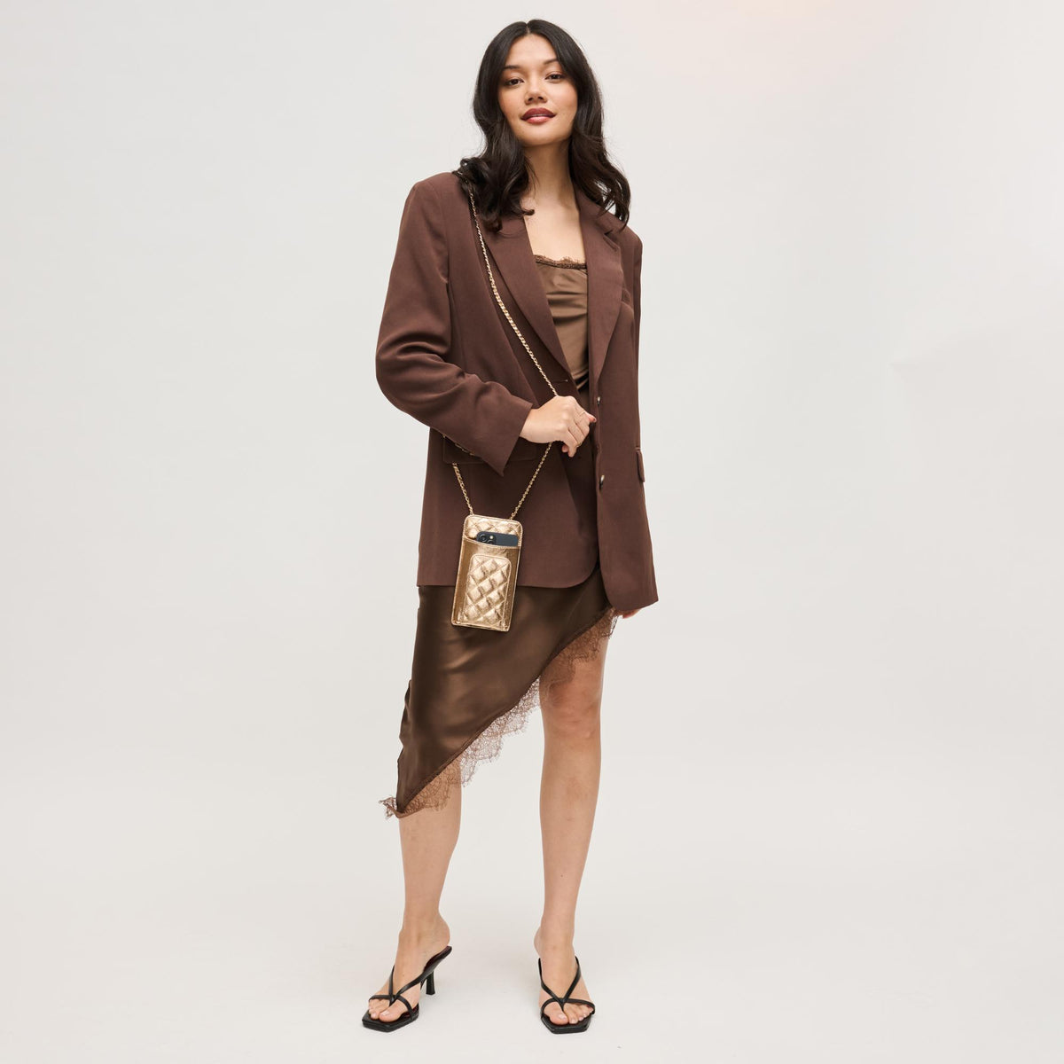 Woman wearing Rose Gold Urban Expressions Brianna 2.0 Cell Phone Crossbody 840504203794 View 3 | Rose Gold