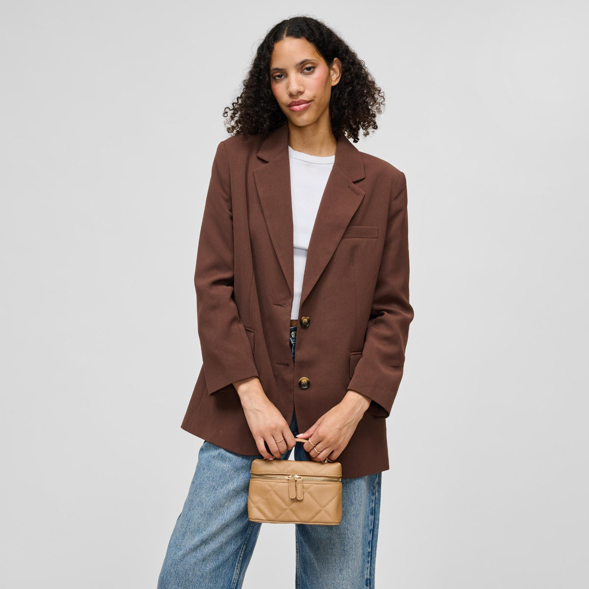 Woman wearing Natural Urban Expressions Snow Crossbody 840504215377 View 2 | Natural