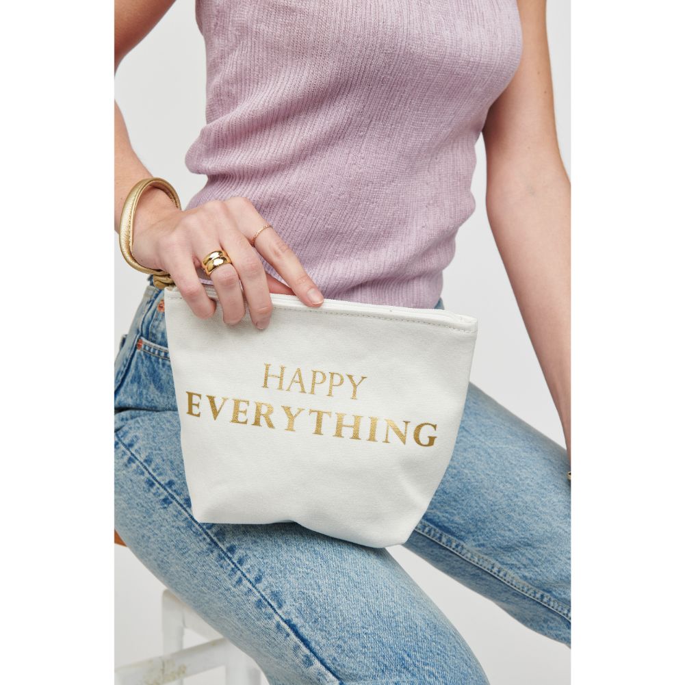 Woman wearing But First Urban Expressions Carry-All Writing Wristlet 818209012461 View 1 | But First