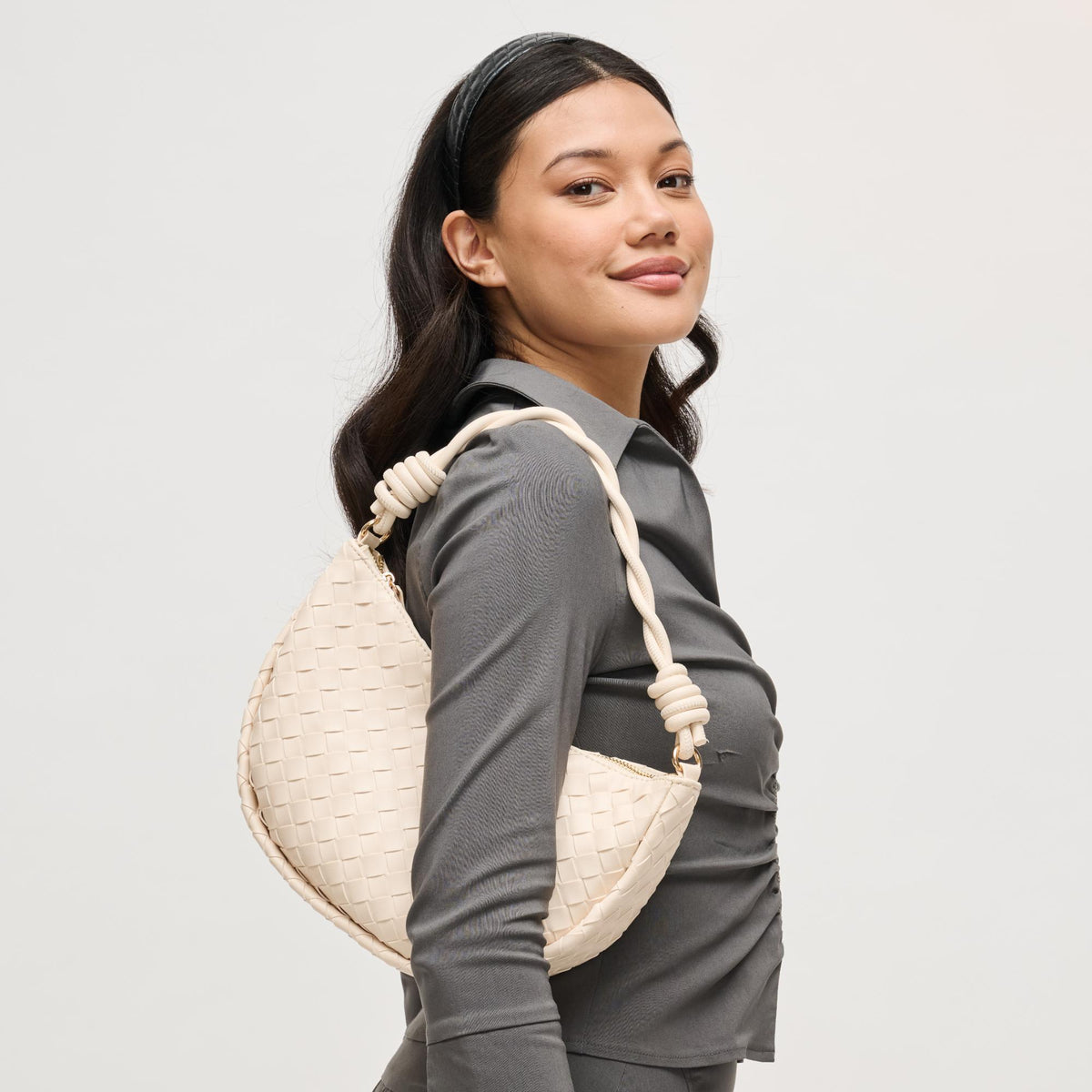 Woman wearing Ivory Urban Expressions Violet Hobo 840504206580 View 1 | Ivory