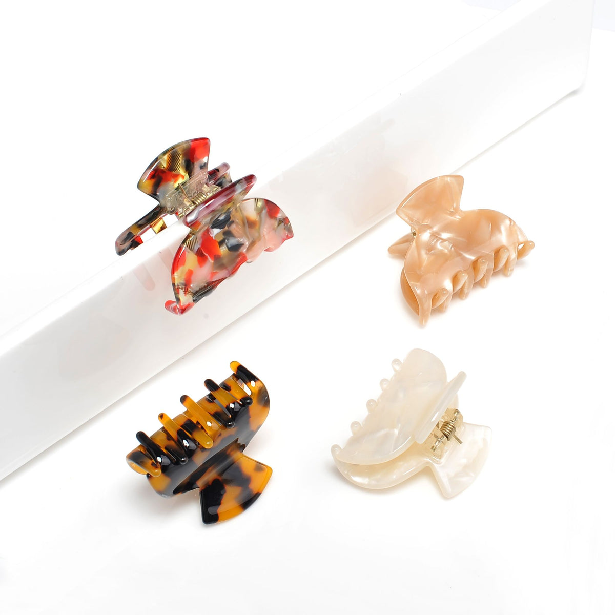 Product Image of Urban Expressions Assorted Mini Hair Claw - 4 Pack Hair Claw 818209013666 View 2 | White Tortoise Red Multi Champagne