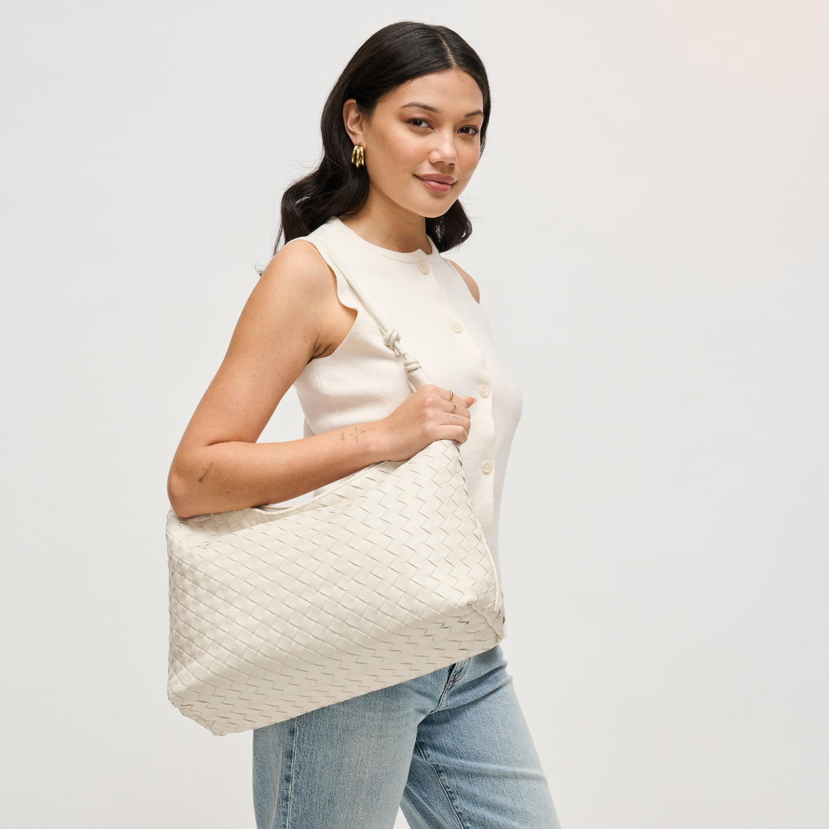 Woman wearing Ivory Urban Expressions Theo Hobo 840504205590 View 3 | Ivory