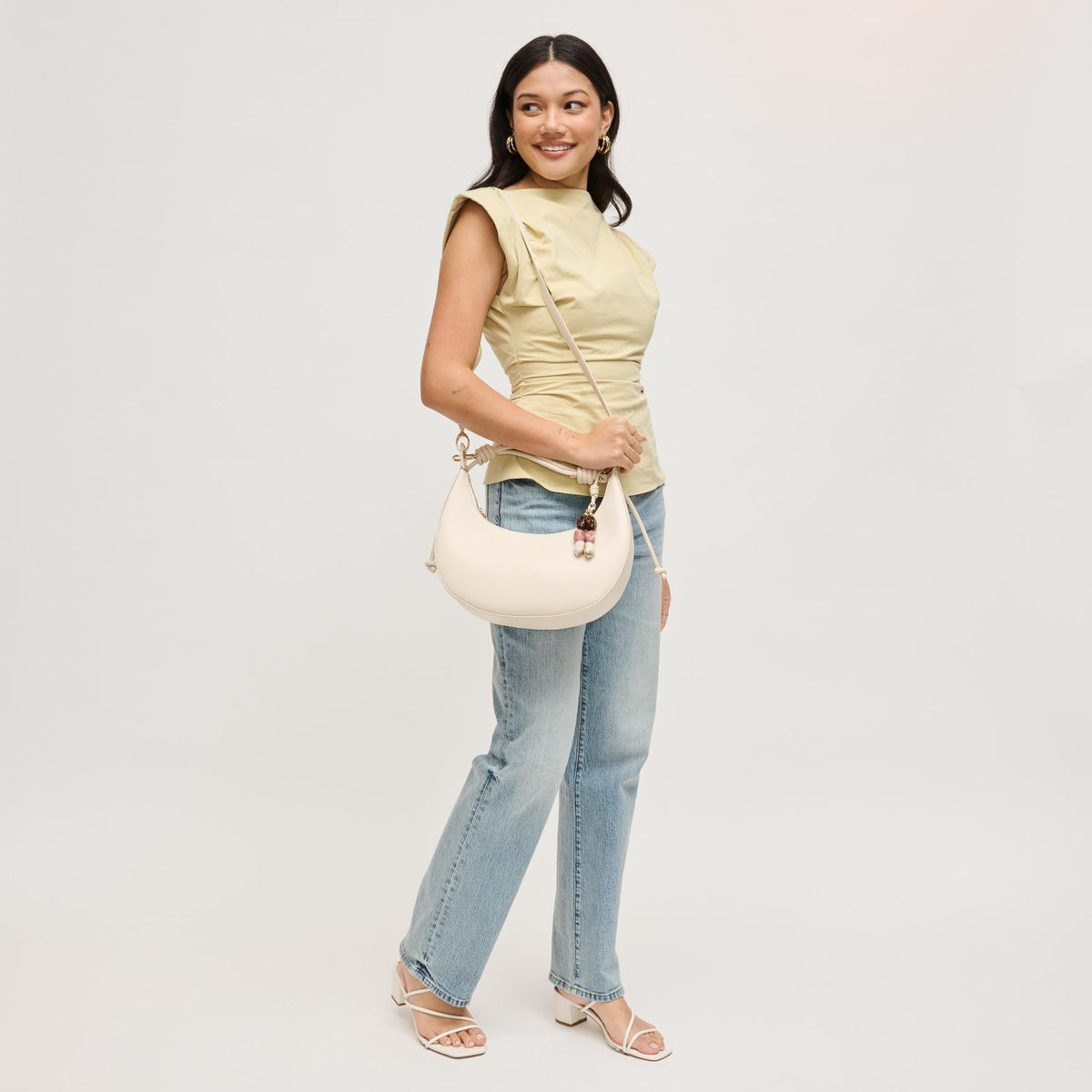 Woman wearing Cream Urban Expressions Emilia Hobo 840504206436 View 3 | Cream
