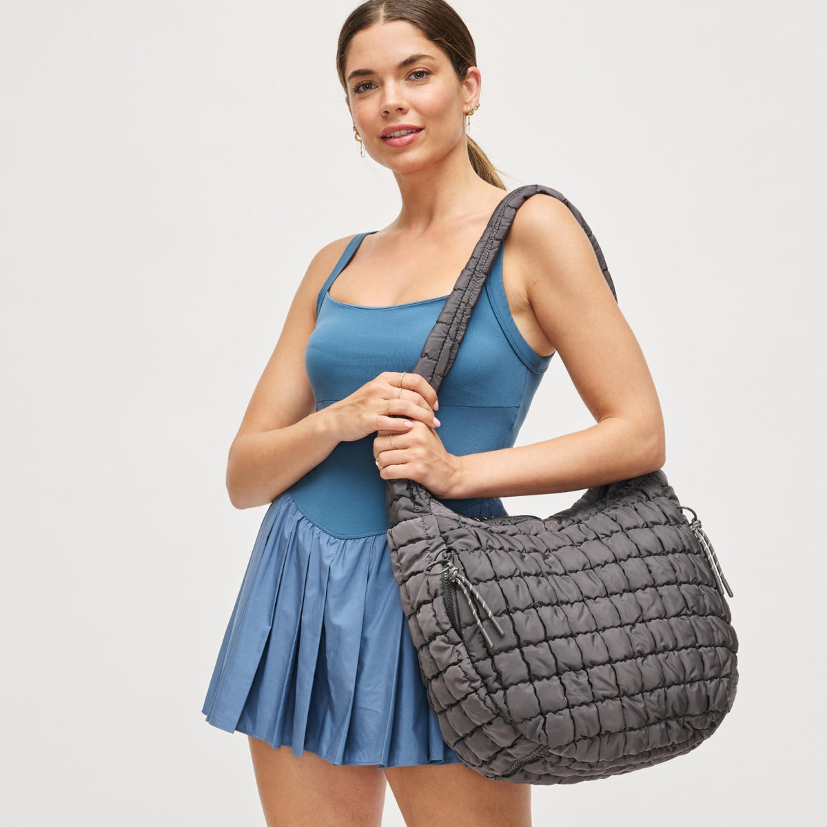 Woman wearing Carbon Urban Expressions Tamsin - Quilted Puffer Hobo 840504200489 View 1 | Carbon