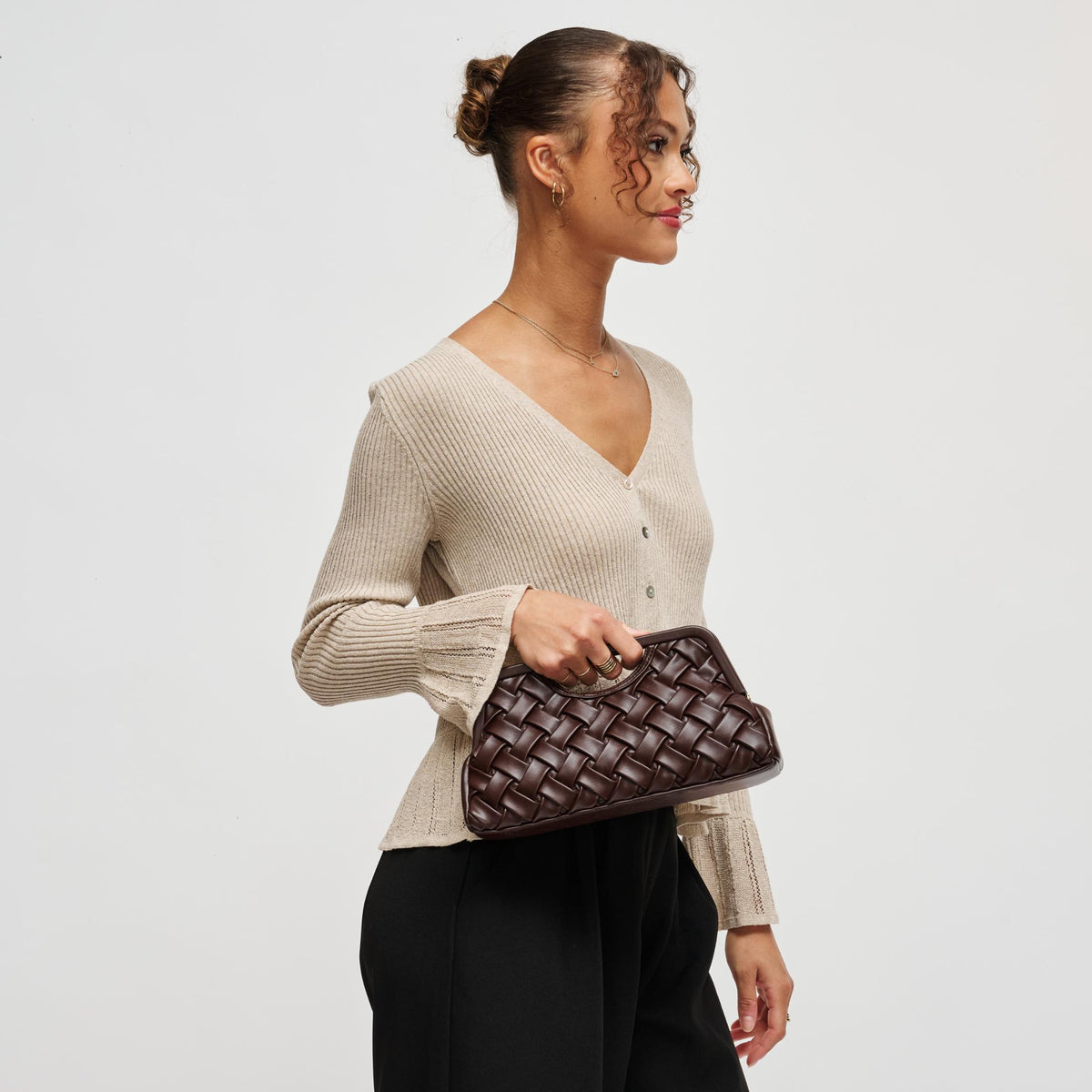 Woman wearing Chocolate Urban Expressions Alouette Clutch 840504211522 View 3 | Chocolate