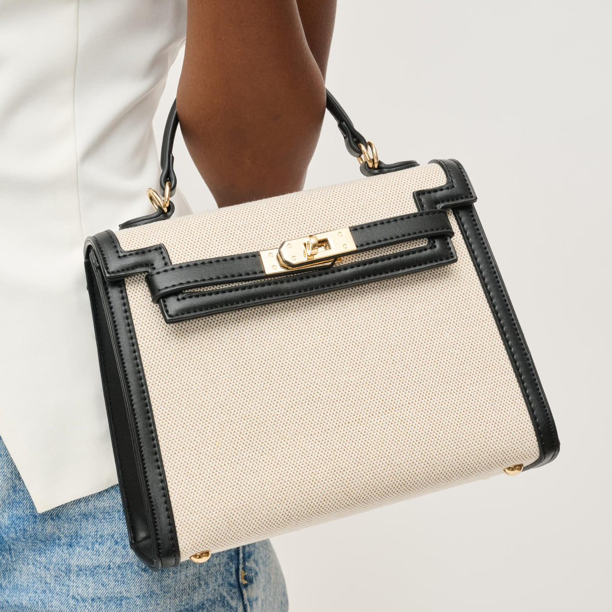 Woman wearing Black Ivory Urban Expressions Cher Clutch 840611146328 View 1 | Black Ivory