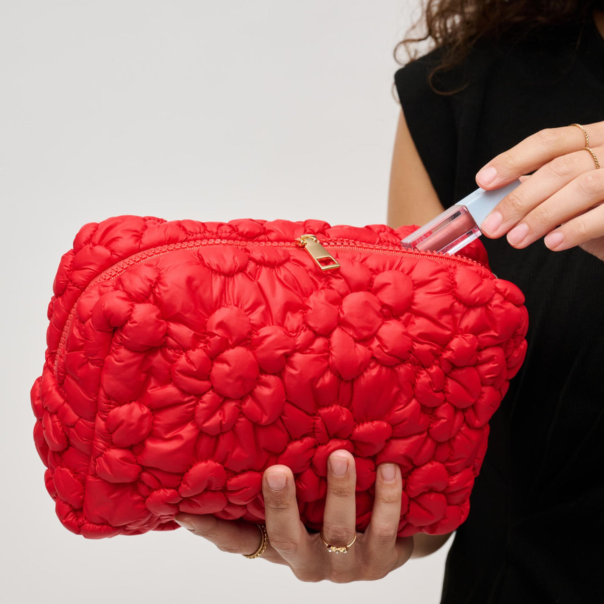 Woman wearing Red Urban Essentials Flora Pop - Nylon Cosmetic & Travel Organizer Pouch 840611144232 View 1 | Red