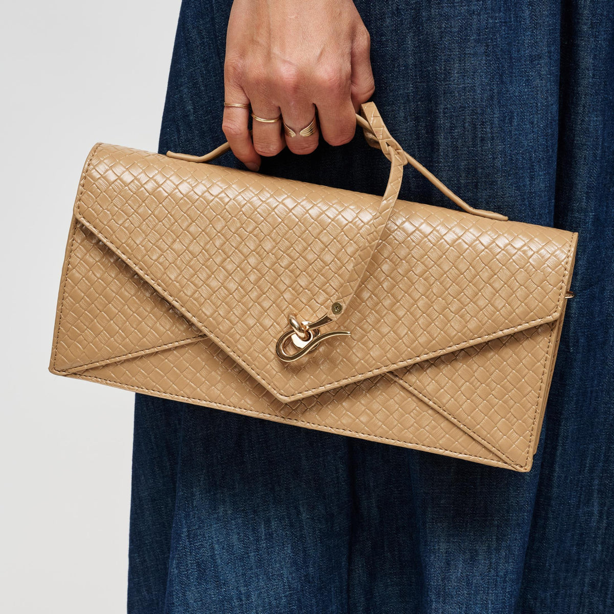 Woman wearing Natural Urban Expressions Khaleesi Clutch 840504211904 View 1 | Natural