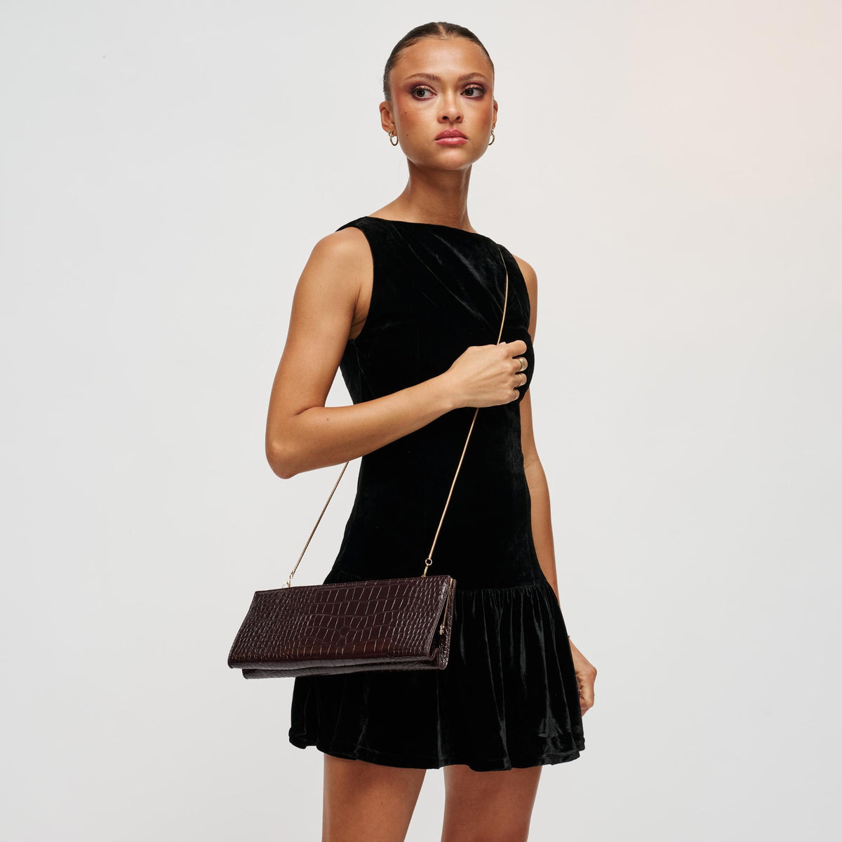 Woman wearing Chocolate Urban Expressions Nazlee - Croc Clutch 840504212611 View 3 | Chocolate