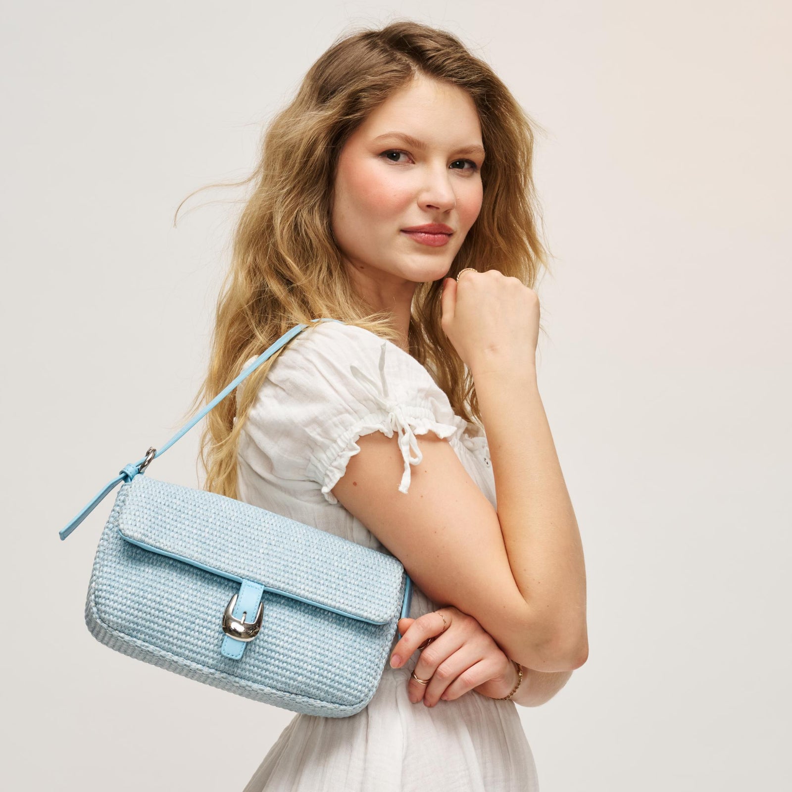 Woman wearing Chocolate Urban Expressions Gloria - Straw Crossbody 840504206696 View 1 | Chocolate