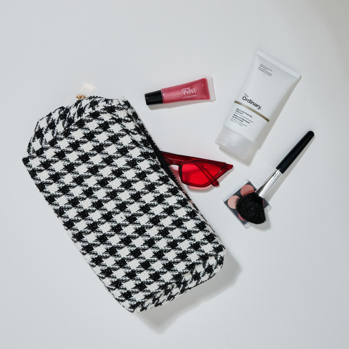 Woman wearing Black Urban Essentials Haute Tooth Cosmetic & Travel Organizer Pouch 840611197207 View 1 | Black