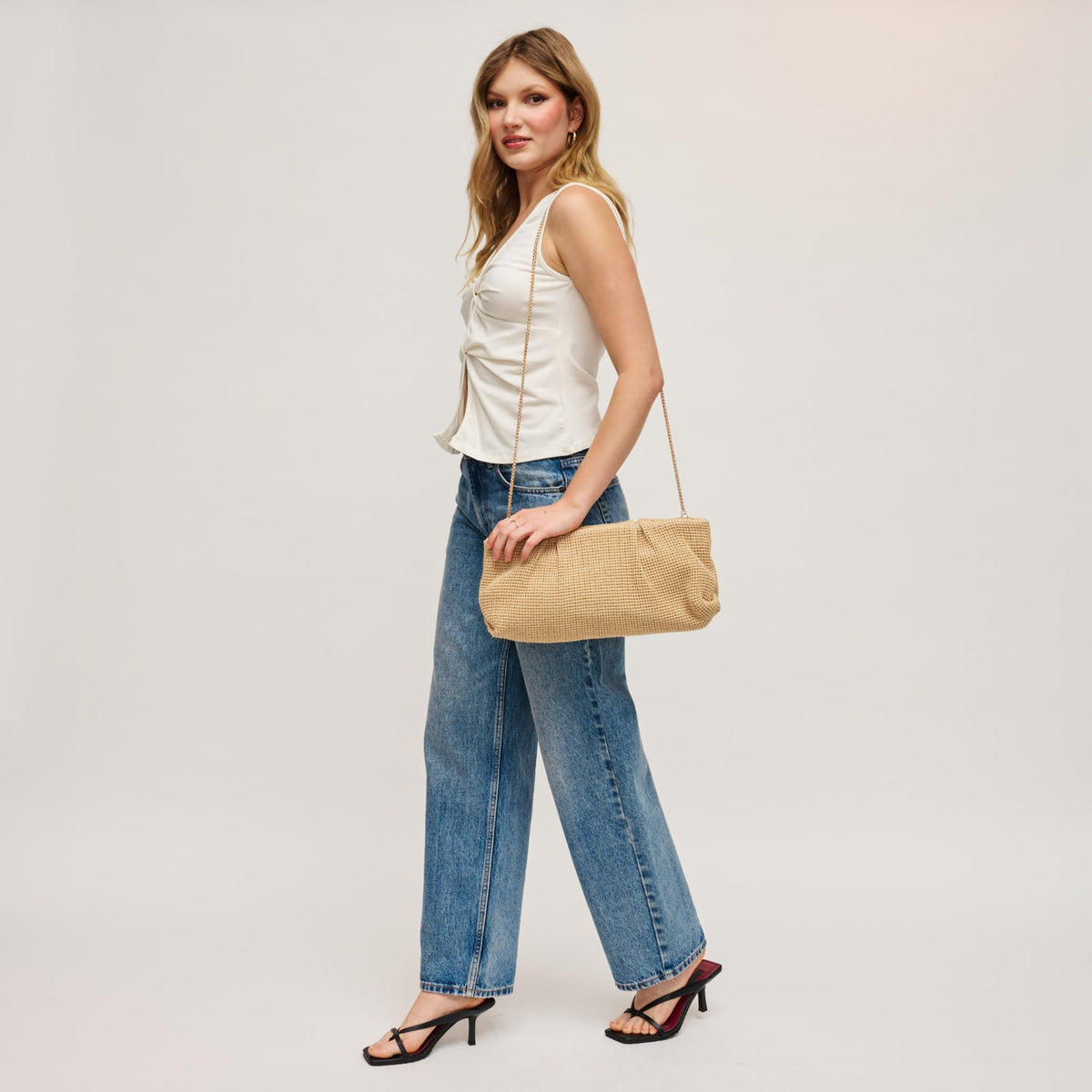 Woman wearing Natural Urban Expressions Franny - Seasonal Clutch 840504208515 View 3 | Natural