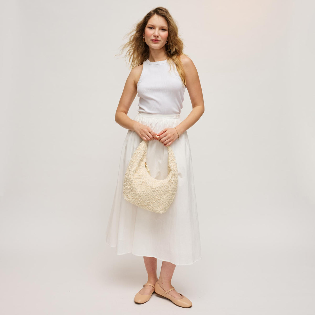 Woman wearing Ivory Urban Expressions Micah Hobo 840504205224 View 4 | Ivory