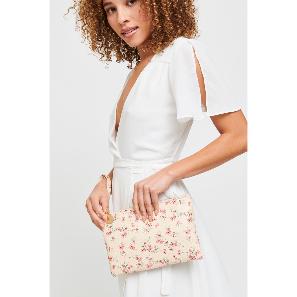 Woman wearing Cream Urban Expressions Joan Floral Wristlet 840611181138 View 1 | Cream