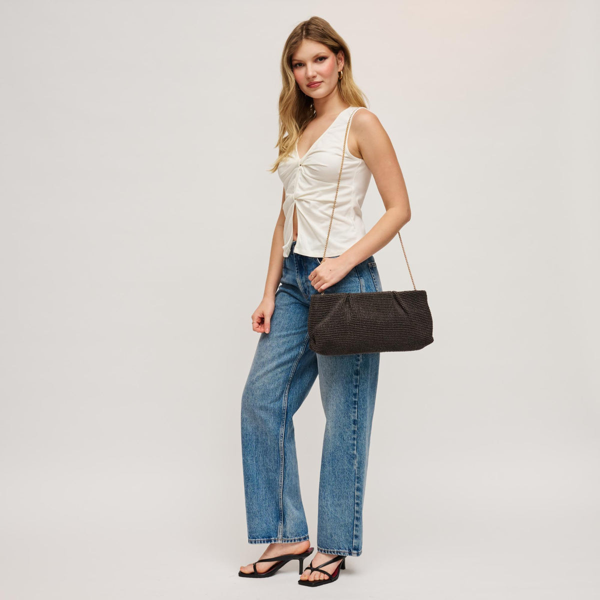 Woman wearing Chocolate Urban Expressions Franny - Seasonal Clutch 840504208522 View 4 | Chocolate