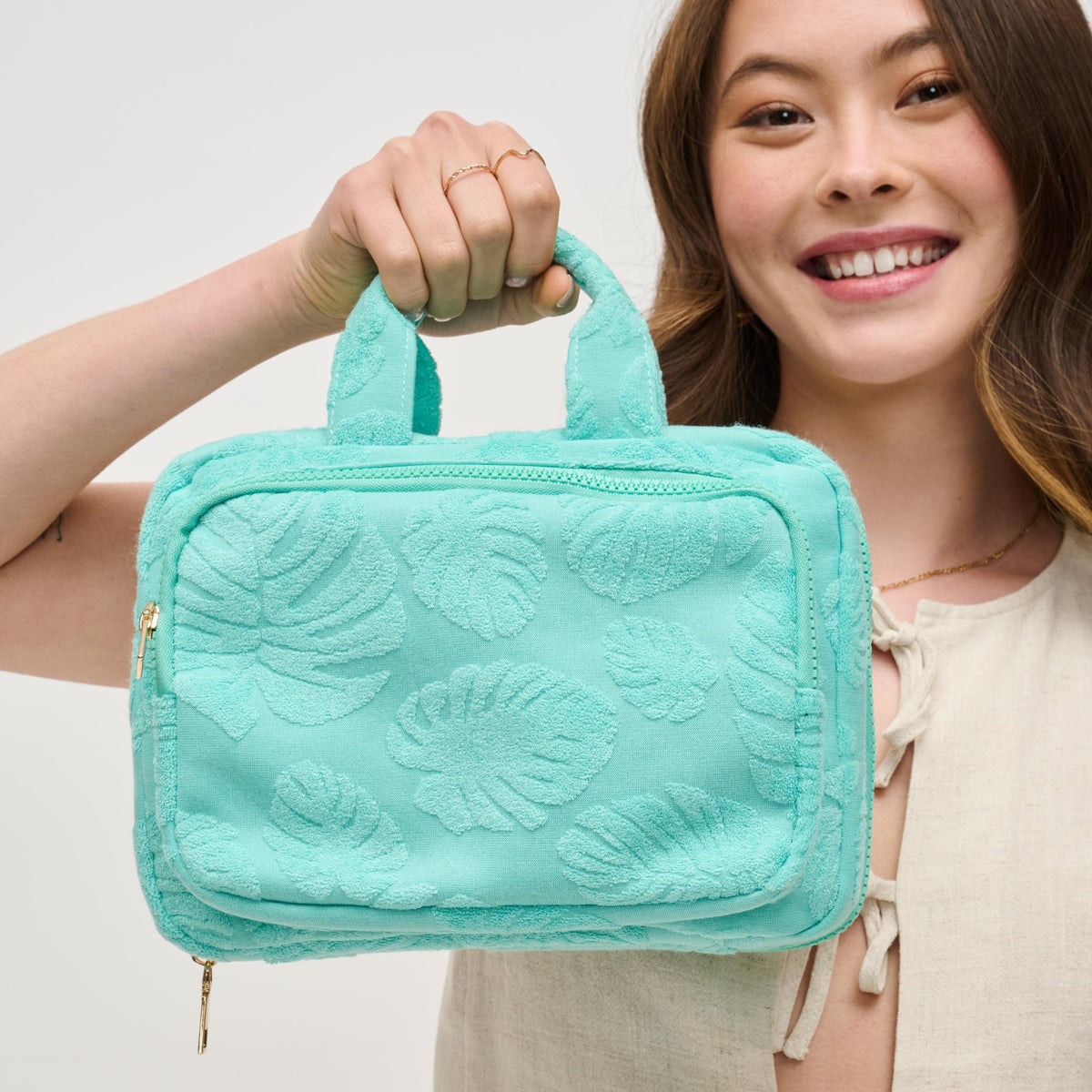 Woman wearing Seafoam Urban Essentials Tropical Dreams Travel Organizer 840611195210 View 1 | Seafoam