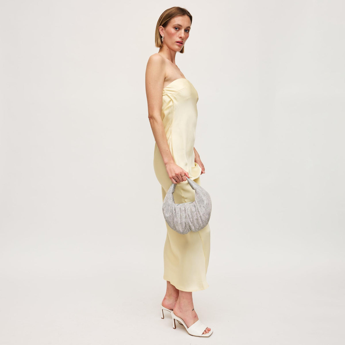 Woman wearing Silver Urban Expressions Arianna Evening Bag 840611160485 View 2 | Silver