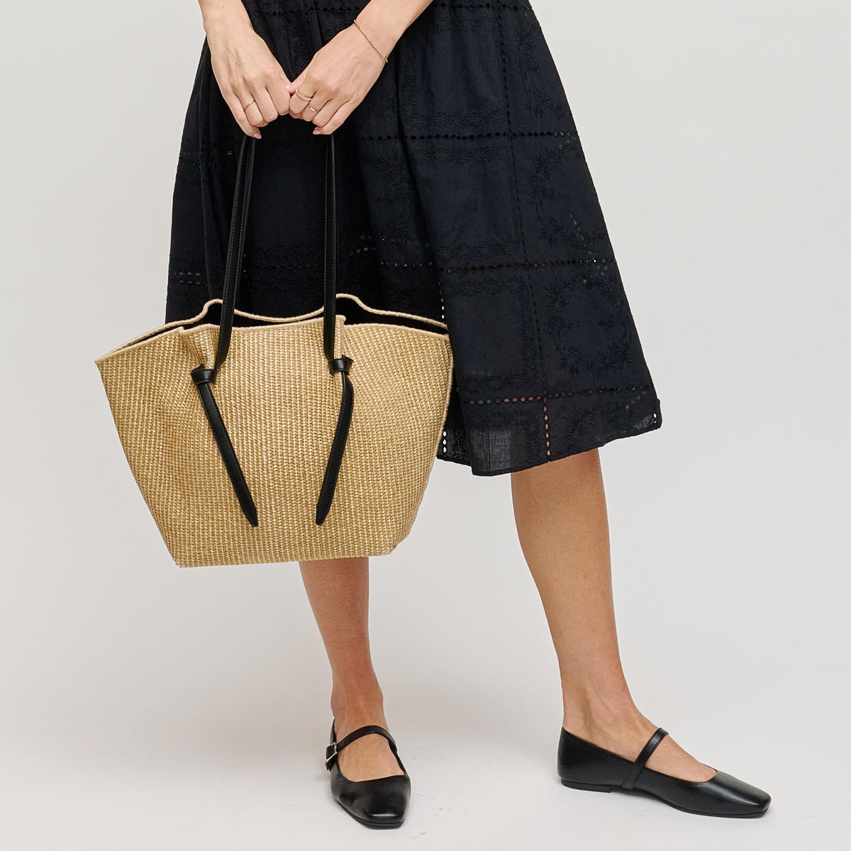 Woman wearing Natural Black Urban Expressions Lorenza Tote - Straw Tote 840504203800 View 3 | Natural Black
