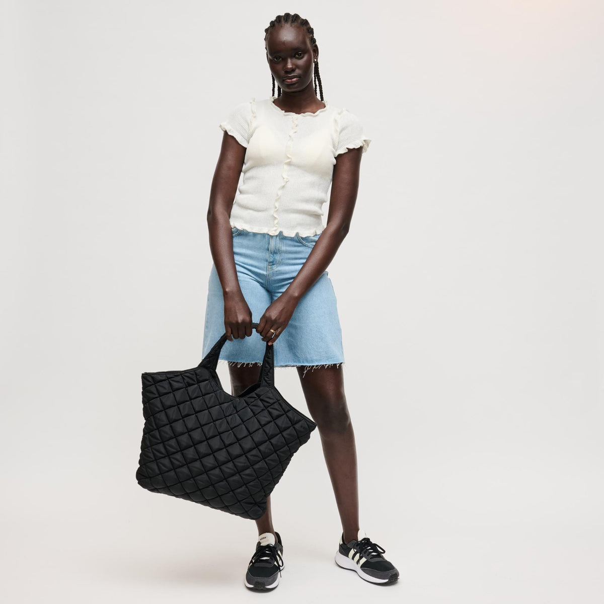 Woman wearing Black Urban Expressions Remmi Tote 840504204036 View 2 | Black