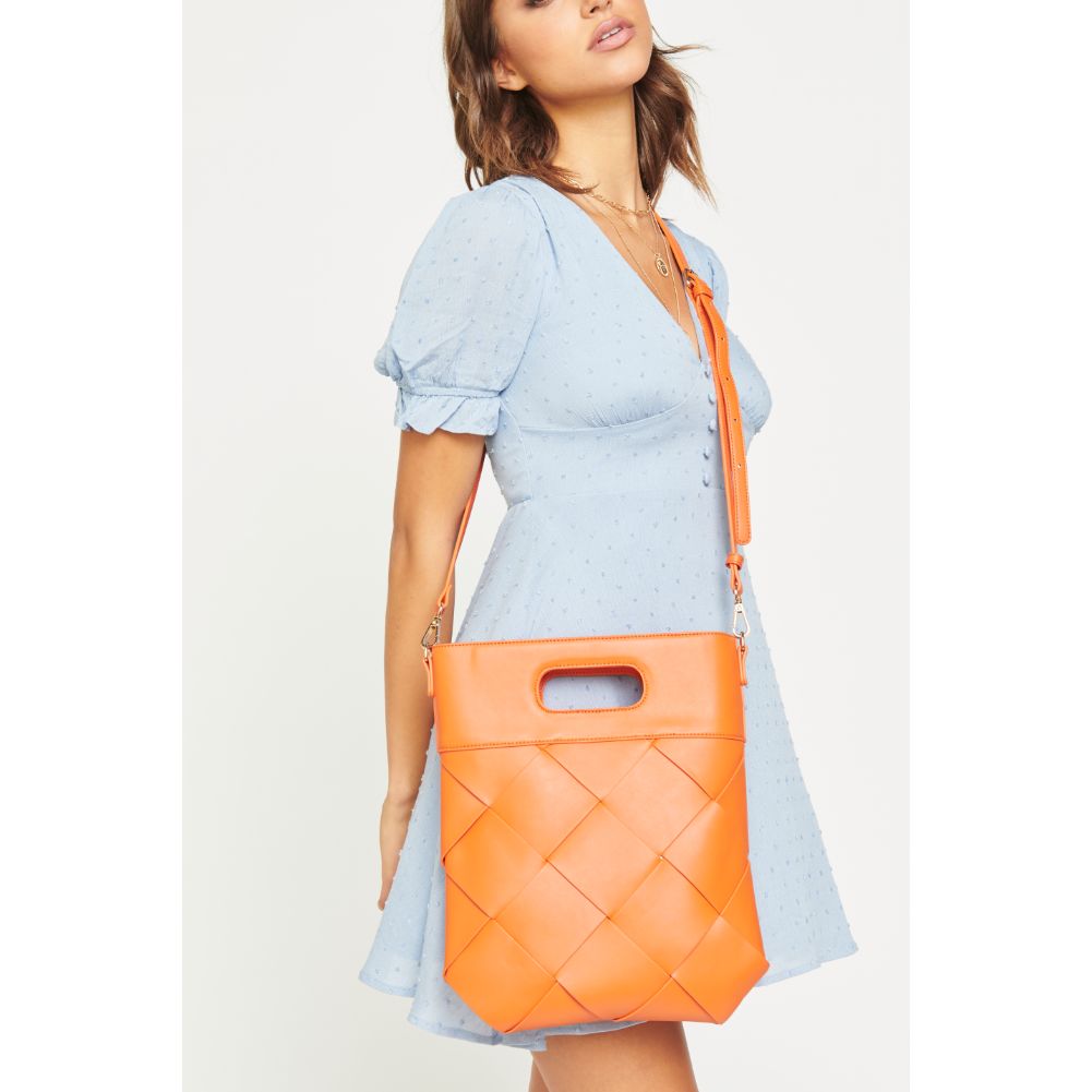 Woman wearing Tangerine Urban Expressions Rosie Crossbody 840611172396 View 3 | Tangerine
